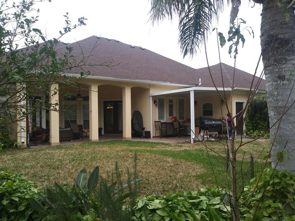 Rivero Roofing crew installing shingles on Valley home